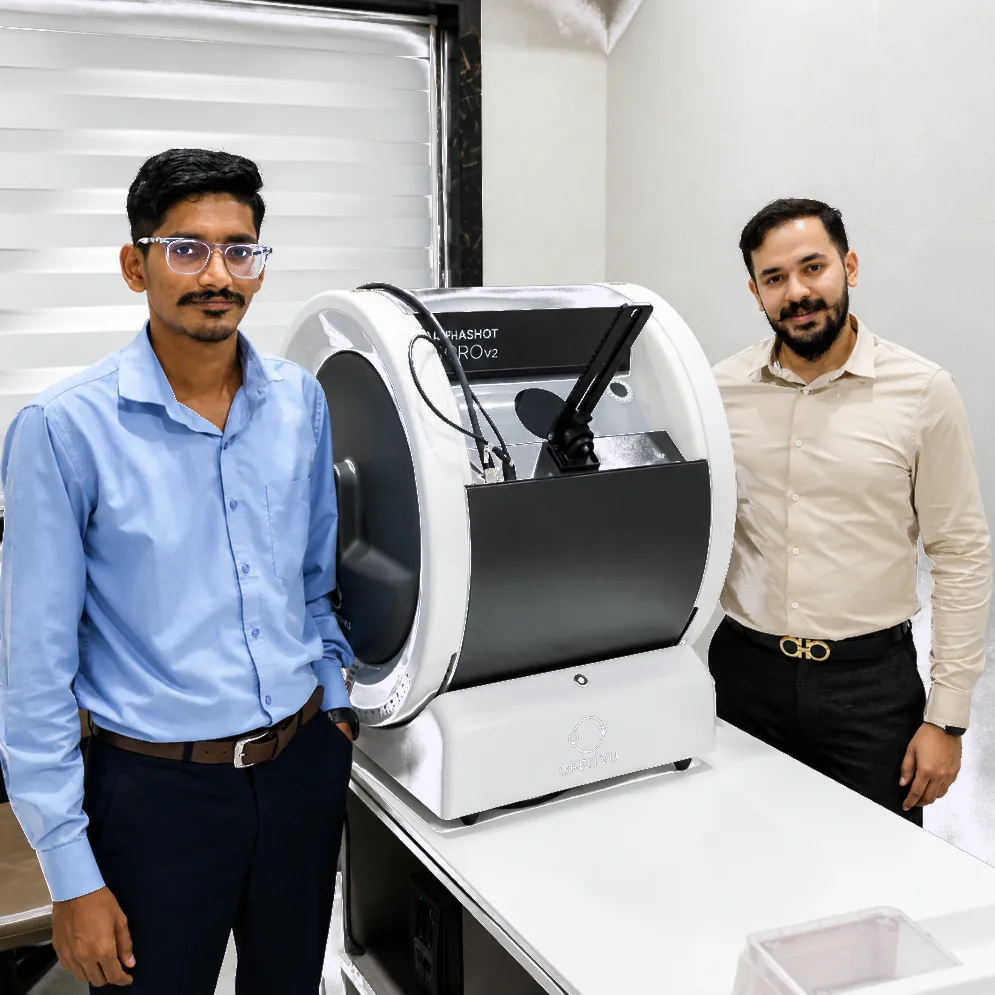 Team members with Alphashot Micro V2 installation