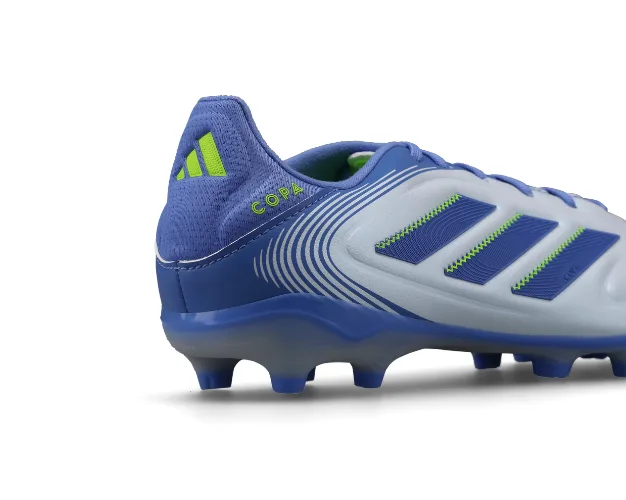 AI Retoucher result on a football boot, blemishes removed and lighting refined